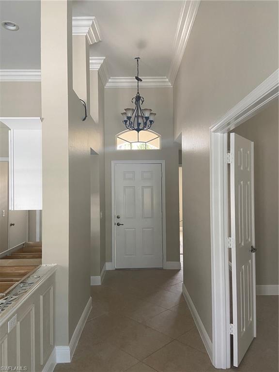 22171 Seashore Circle Estero, FL 33928 - Photo 2 of 16 a view of a kitchen from the hallway