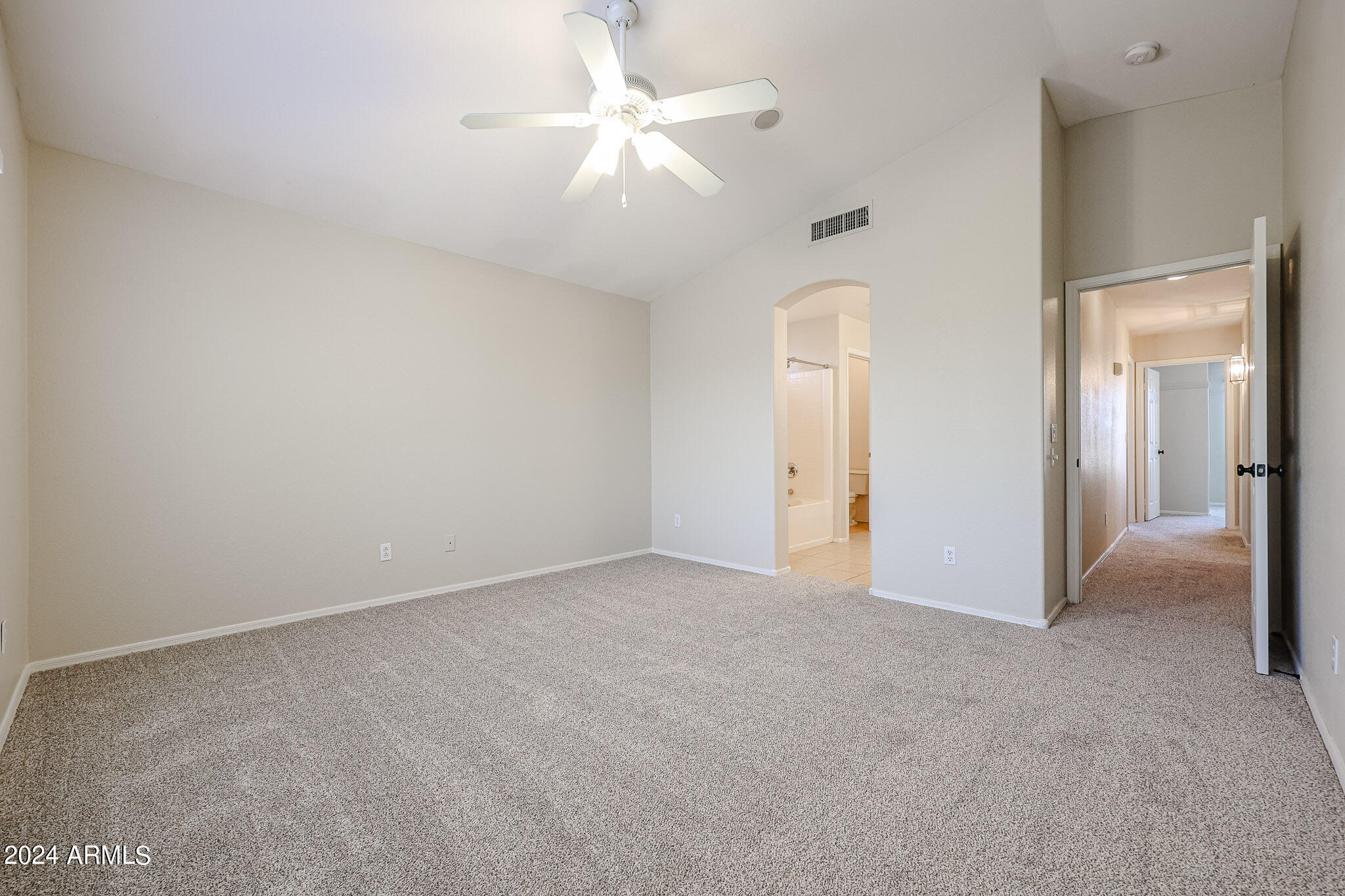 6921 West Juniper Avenue Peoria, AZ 85382 - Photo 20 of 33 an empty room with fan and entrance