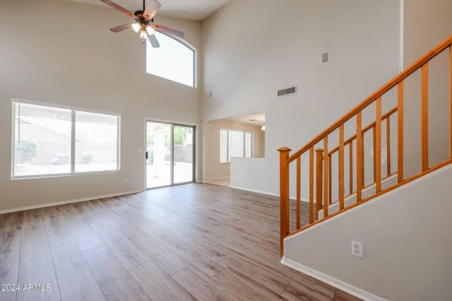 a view of an entryway with wooden floor