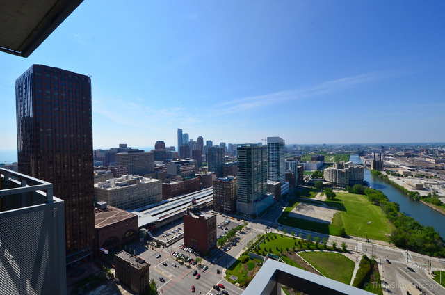 235 West Van Buren Street, Unit 3311 Chicago, IL 60607 - Photo 20 of 23 a city view with tall buildings