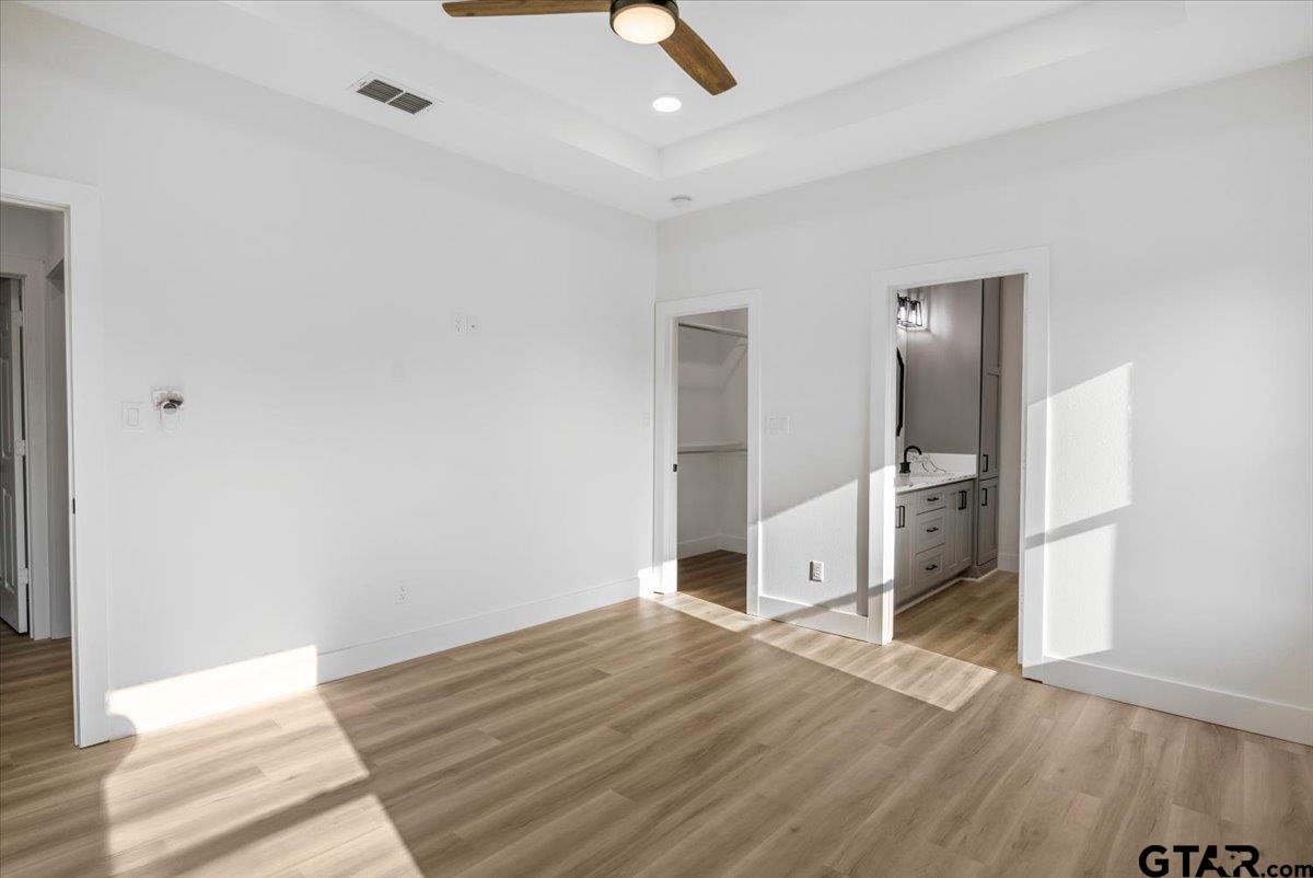 6600 Lionheart Drive Tyler, TX 75708 - Photo 13 of 32 a view of empty room with wooden floor