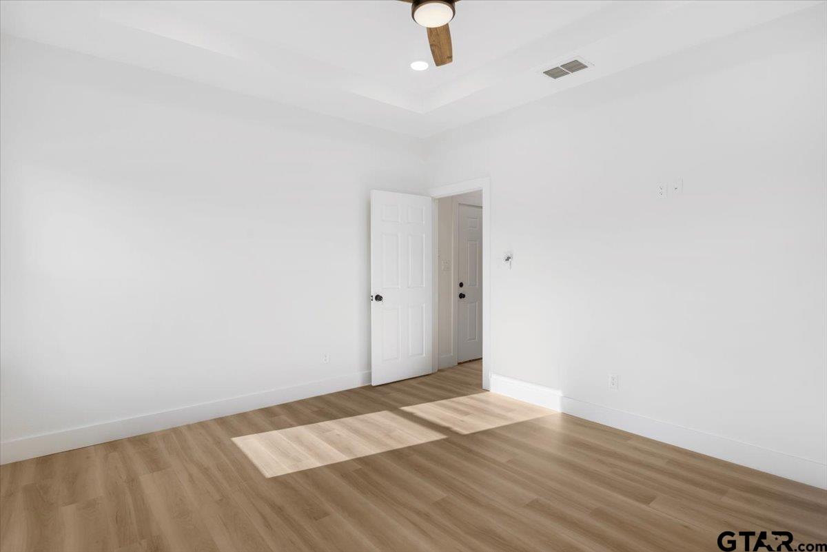 6600 Lionheart Drive Tyler, TX 75708 - Photo 14 of 32 a view of empty room with wooden floor
