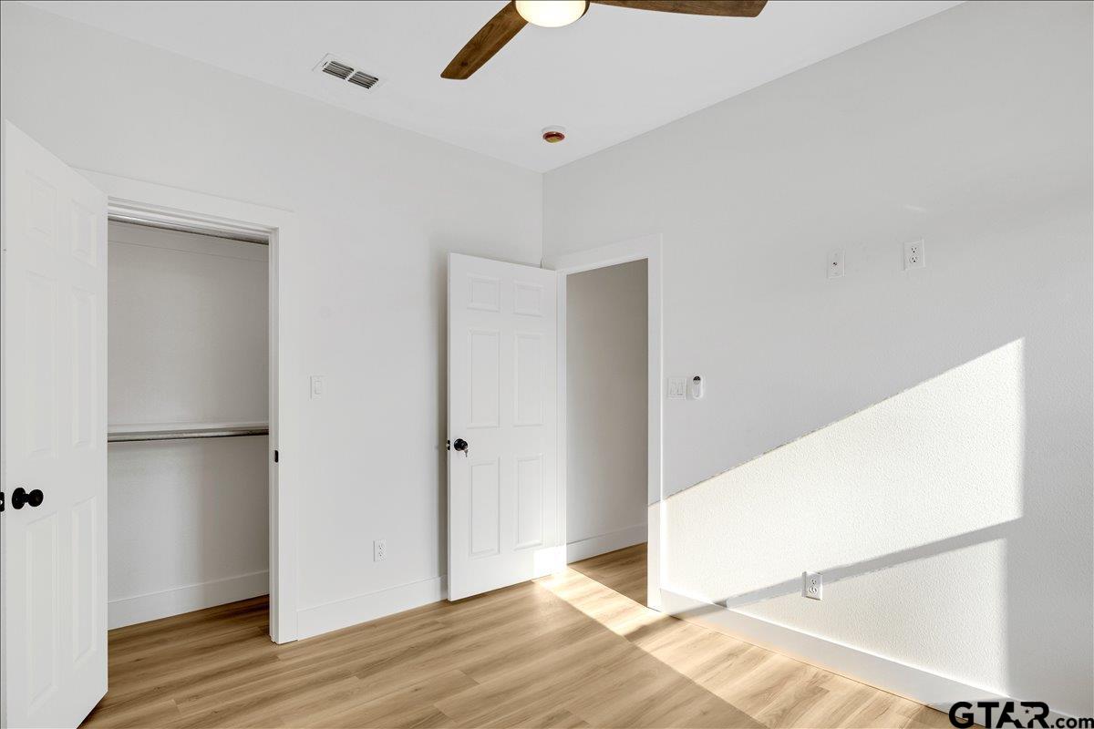 6600 Lionheart Drive Tyler, TX 75708 - Photo 25 of 32 a view of a livingroom with wooden floor