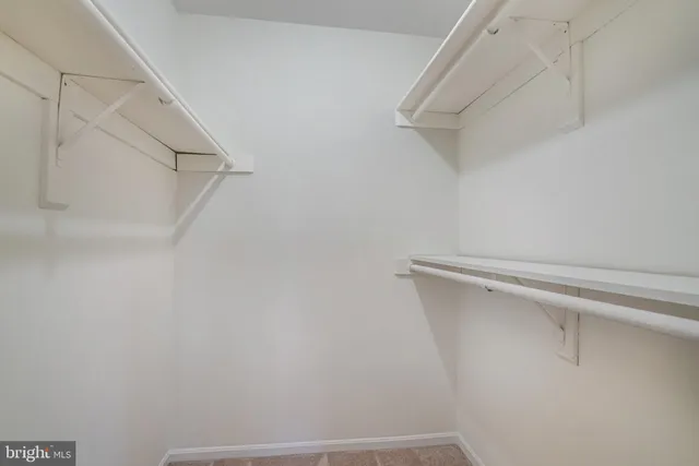 a view of small space with racks on the wall