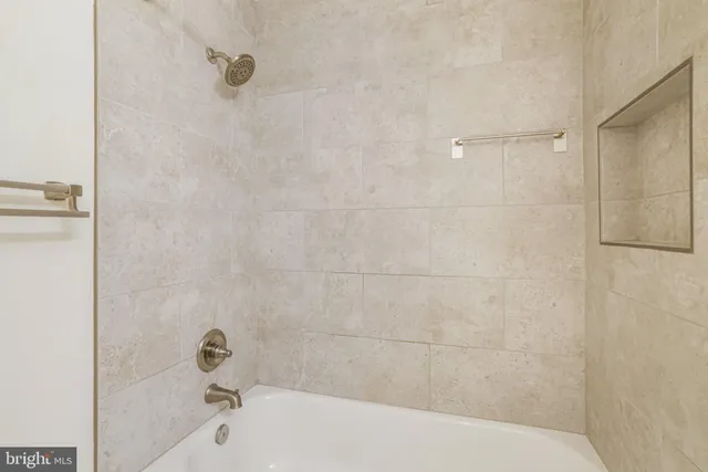 a bathroom with a bathtub