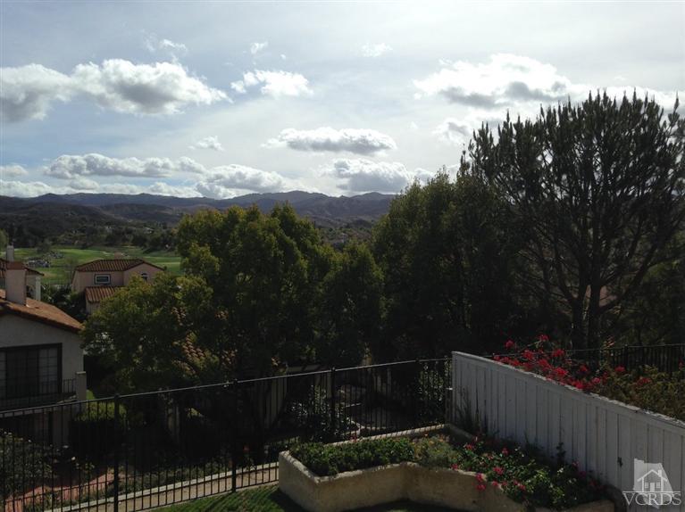 876 Congressional Road Simi Valley, CA 93065 - Photo 14 of 19 a terrace with outdoor seating and trees
