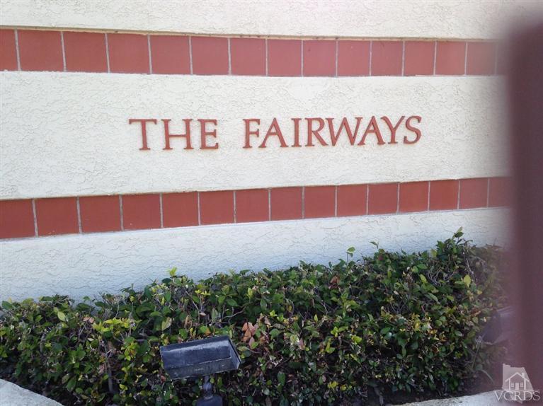 876 Congressional Road Simi Valley, CA 93065 - Photo 10 of 19 a sign that is sitting in front of flowers