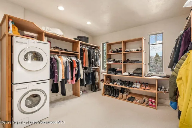 a view of a storage & utility room with washer and dryer