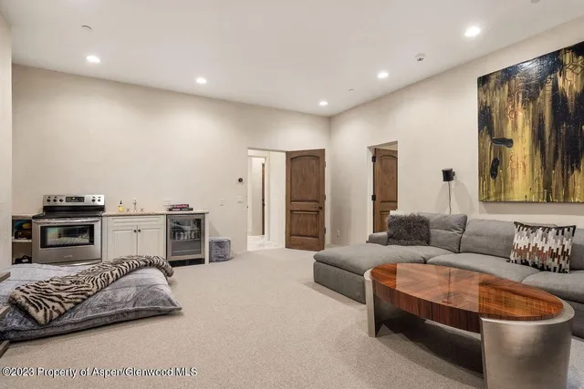 a living room with furniture and a couch