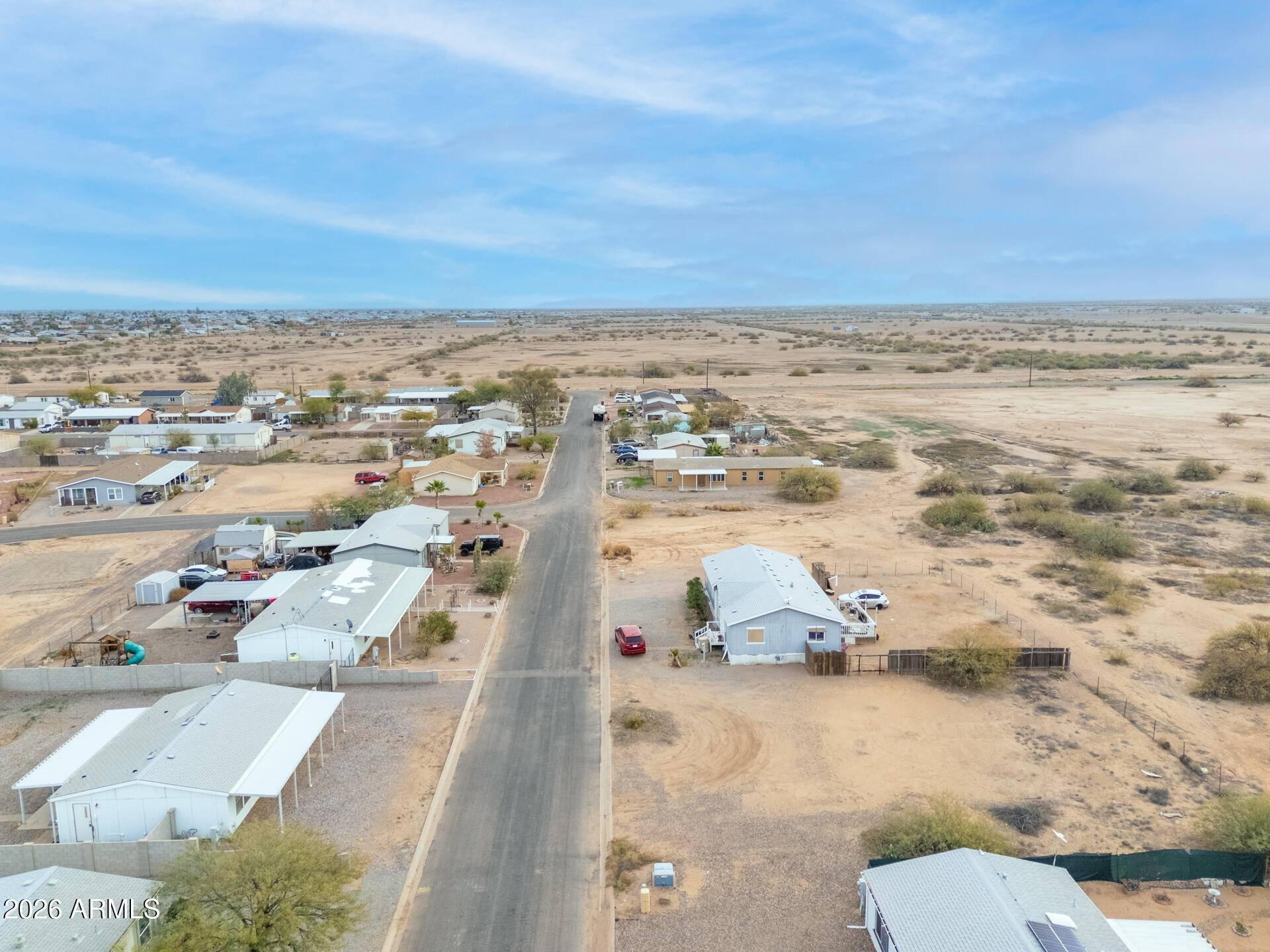 11511 Stagecoach Road, Unit 111 Arizona City, AZ 85123 - Photo 7 of 12 an aerial view of residential houses with outdoor space
