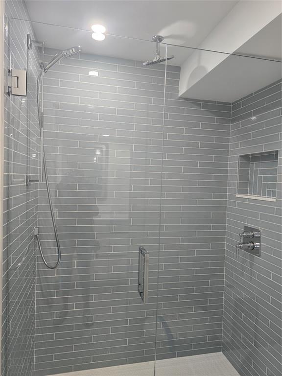 328 North Ocean Boulevard, Unit 501 Pompano Beach, FL 33062 - Photo 5 of 17 a bathroom with a shower