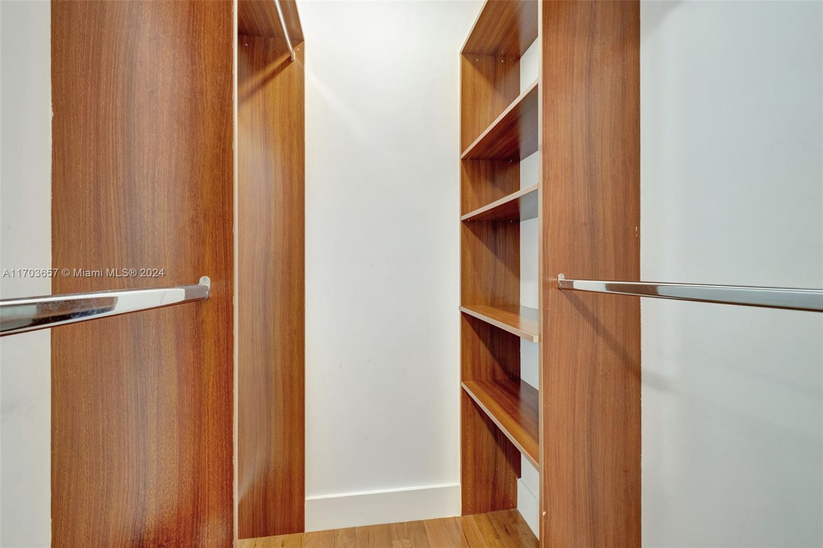 141 Southwest 51st Court, Unit 141 Miami, FL 33134 - Photo 26 of 38 a view of an empty walk in closet