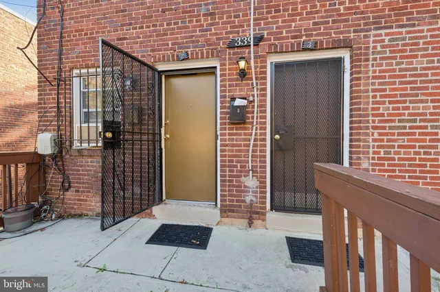 a brick house with a outdoor space