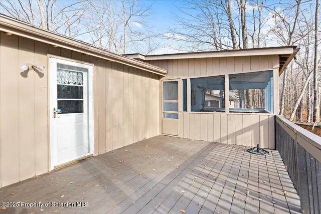 a view of a house with a large window