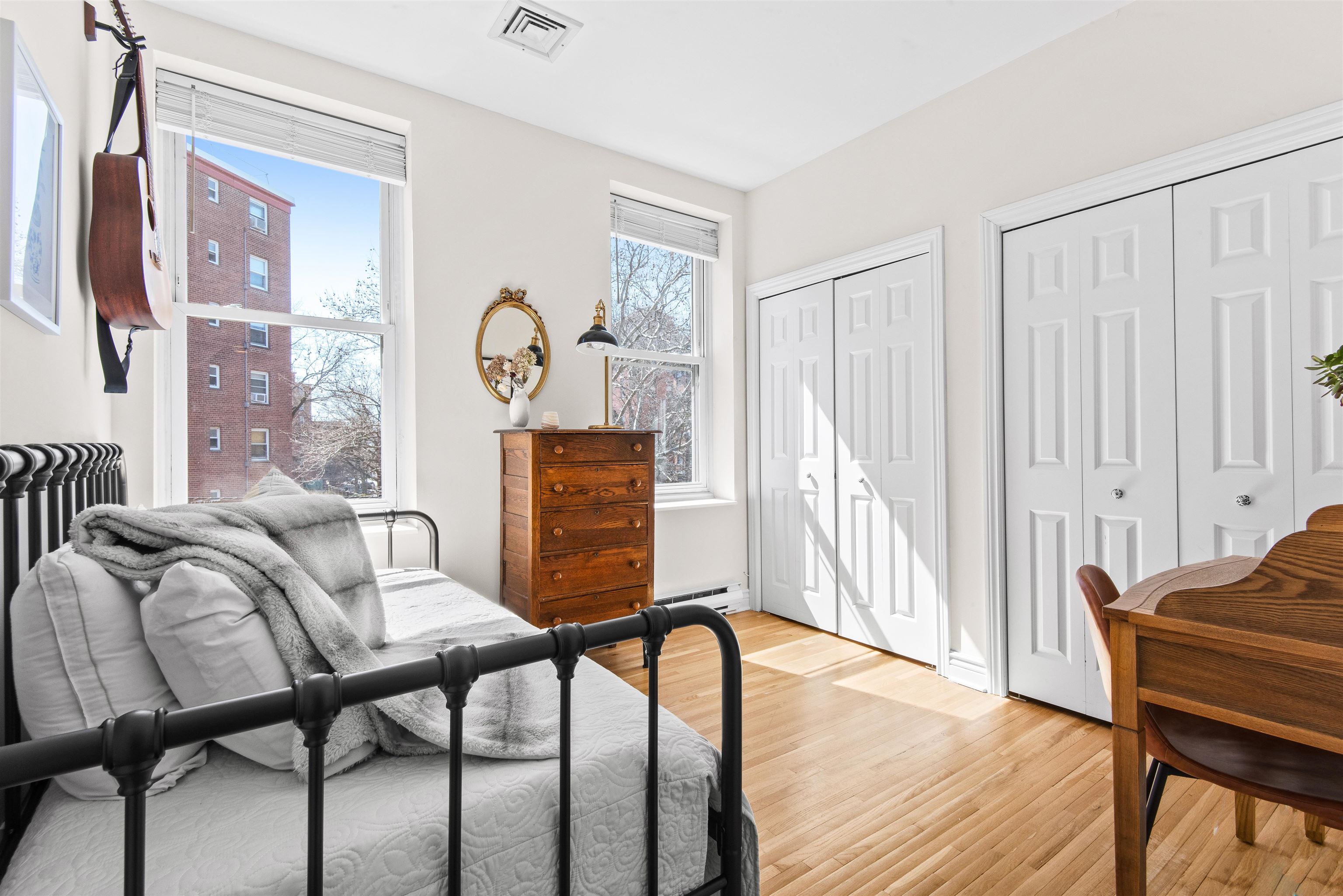 456 9th Street, Unit 9 Hoboken, NJ 07030 - Photo 15 of 29 a view of a dining room with furniture and a window