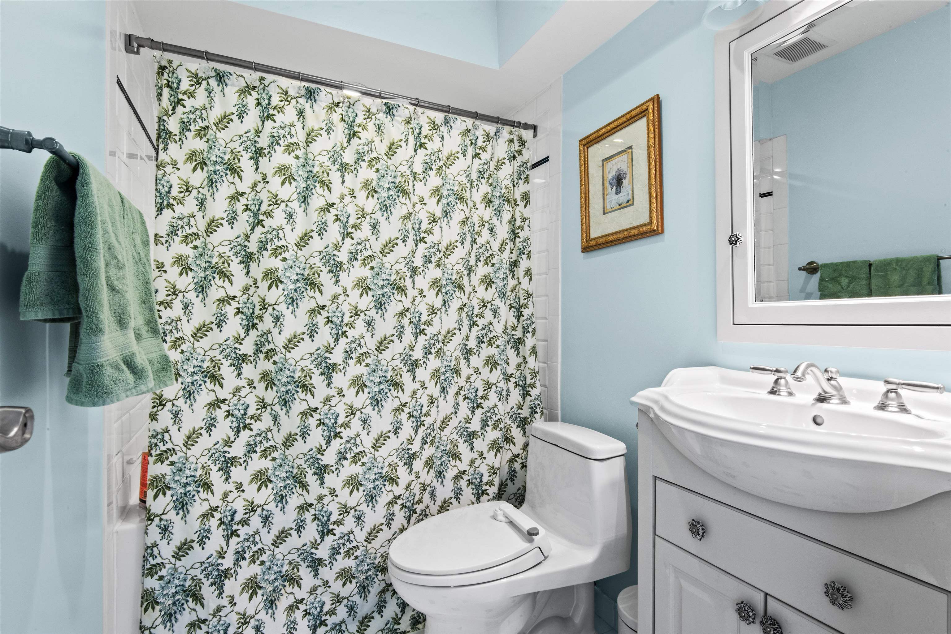 456 9th Street, Unit 9 Hoboken, NJ 07030 - Photo 16 of 29 a bathroom with a sink toilet and a mirror