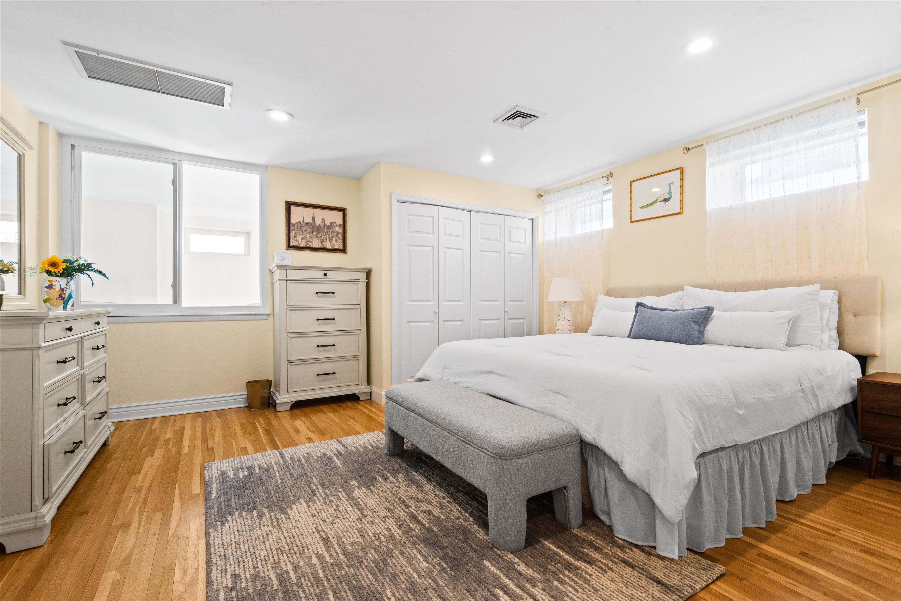 456 9th Street, Unit 9 Hoboken, NJ 07030 - Photo 19 of 29 a spacious bedroom with a bed and a window
