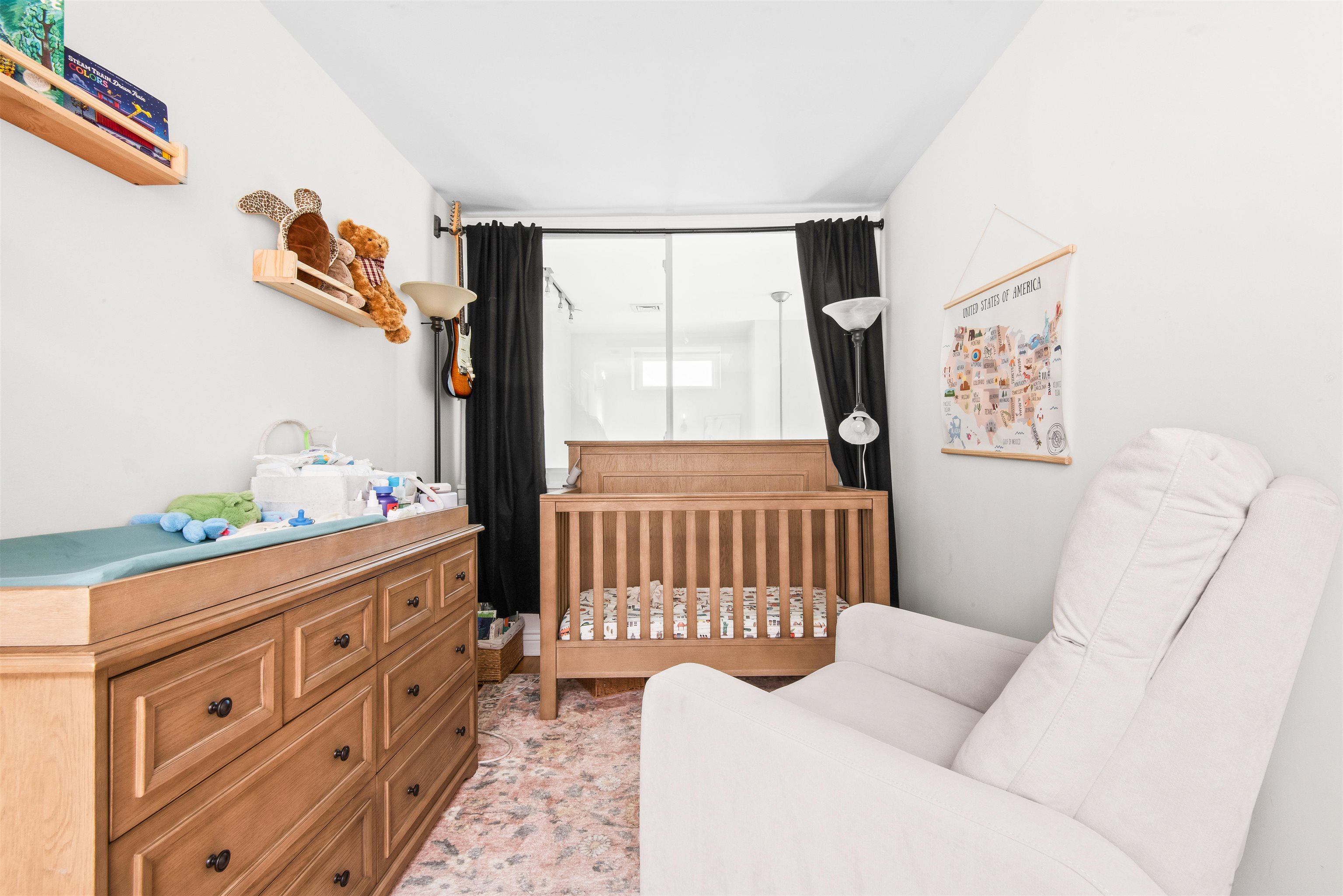 456 9th Street, Unit 9 Hoboken, NJ 07030 - Photo 20 of 29 a bedroom with furniture and wooden floor