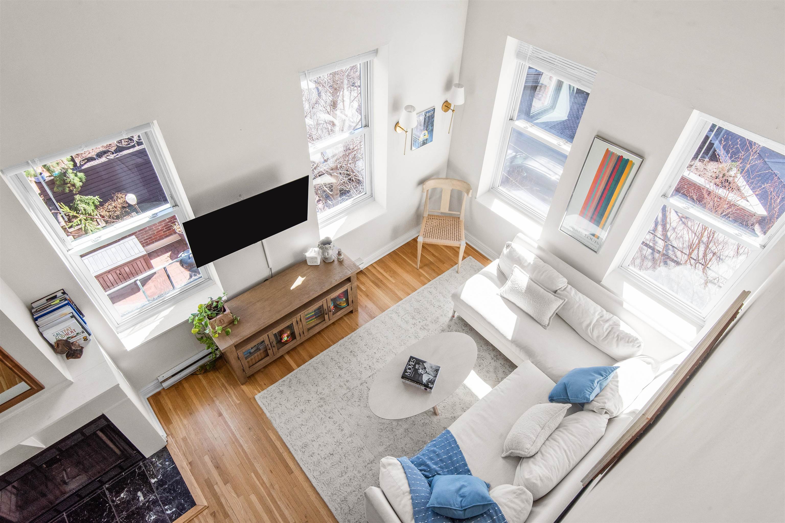 456 9th Street, Unit 9 Hoboken, NJ 07030 - Photo 4 of 29 a living room with furniture and a flat screen tv