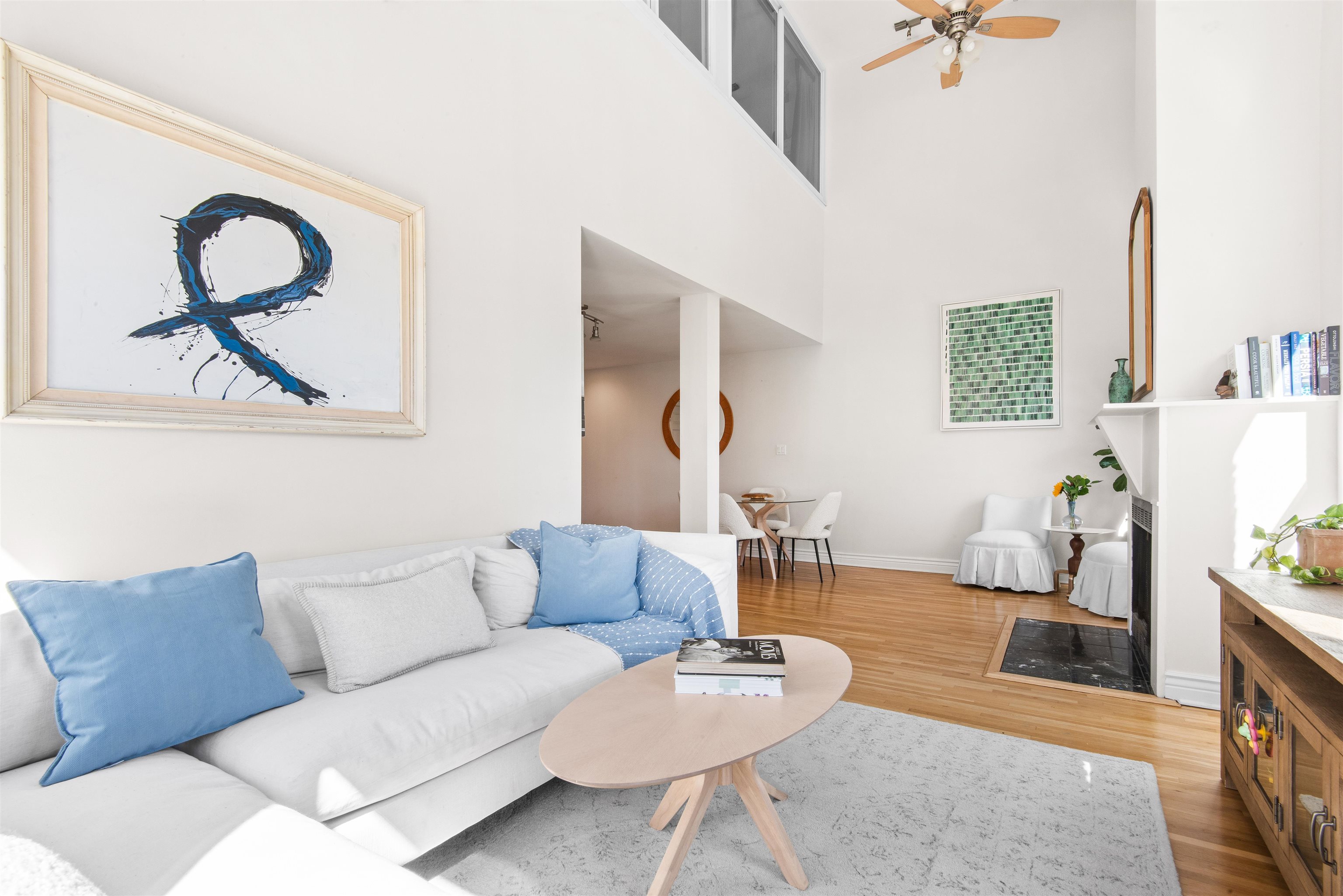 456 9th Street, Unit 9 Hoboken, NJ 07030 - Photo 5 of 29 a living room with furniture and a wooden floor