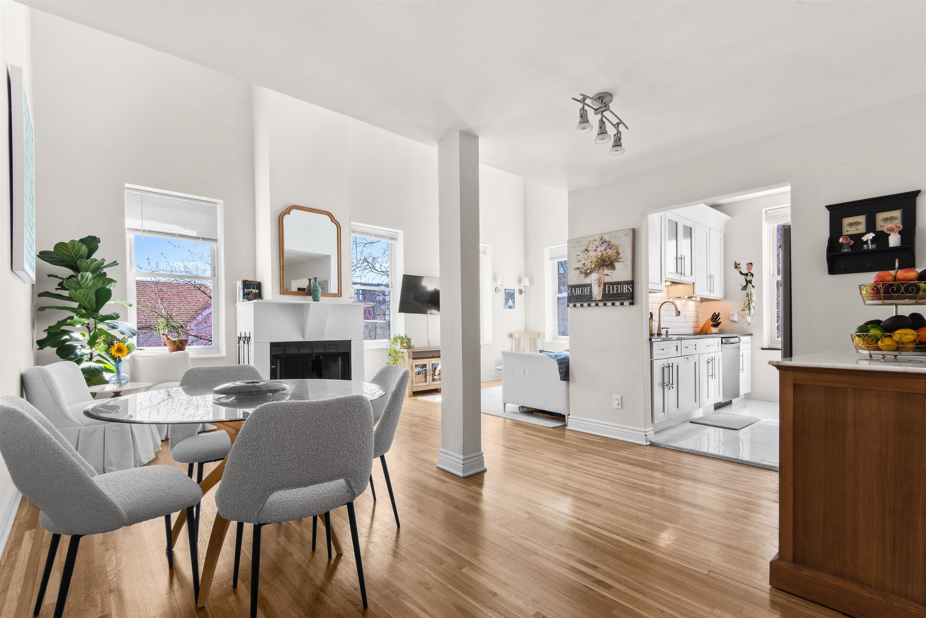 456 9th Street, Unit 9 Hoboken, NJ 07030 - Photo 9 of 29 a view of a dining room with furniture and wooden floor