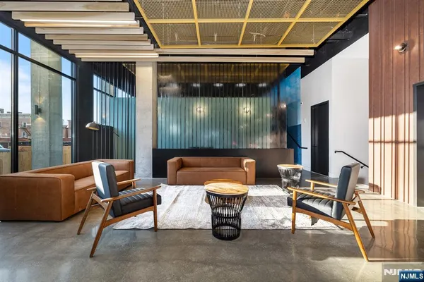 a outdoor living space with patio furniture and a potted plant