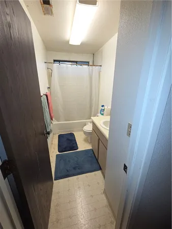 a bathroom with sink and mirror