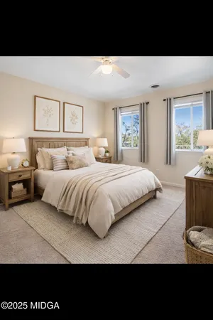 a view of an empty room and a ceiling fan