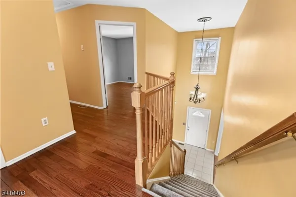 a view of balcony and wooden floor