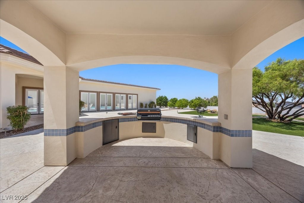 640 Quail Covey Road Henderson, NV 89002 - Photo 49 of 75 View of patio and outdoor BBQ kitchen and Pool House