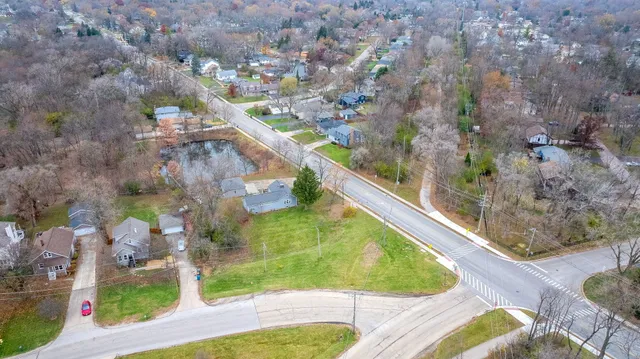 a view of swimming pool with a yard