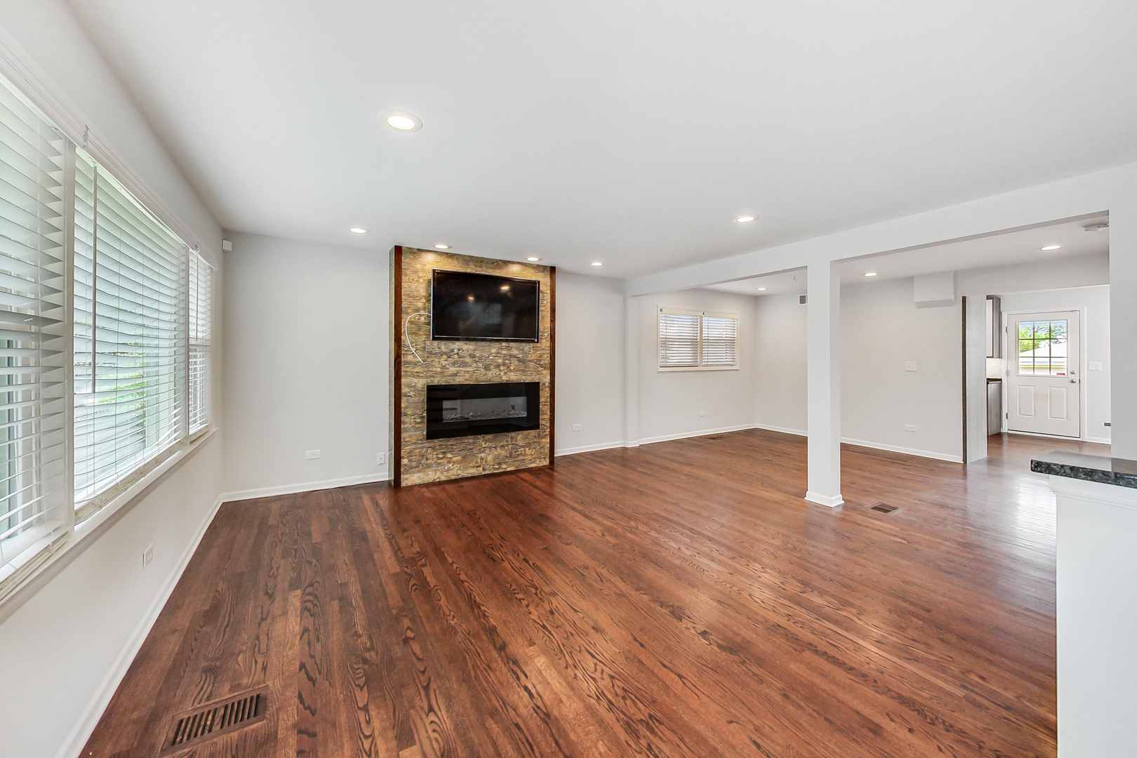 Undisclosed Address Chicago, IL 60634 - Photo 2 of 2 a view of empty room with wooden floor and window