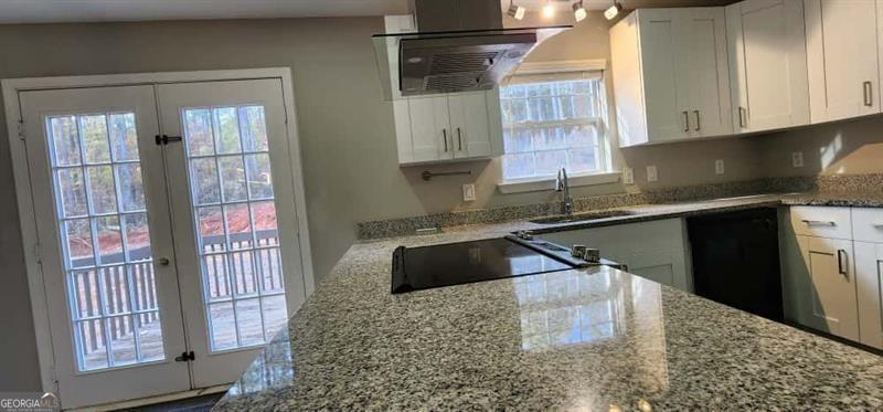 4872 Lewis Road Powder Springs, GA 30127 - Photo 13 of 42 a kitchen with a sink and cabinets