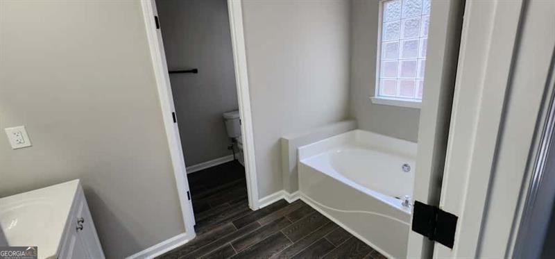 4872 Lewis Road Powder Springs, GA 30127 - Photo 21 of 42 a bathroom with a bathtub