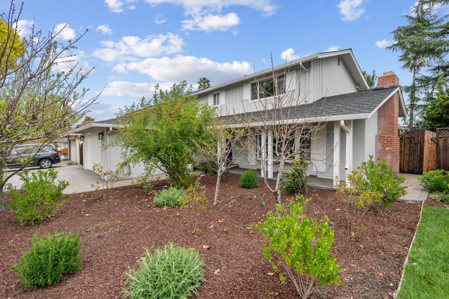 1130 Polk Lane San Jose, CA 95117 - Photo 3 of 47 a front view of a house with garden