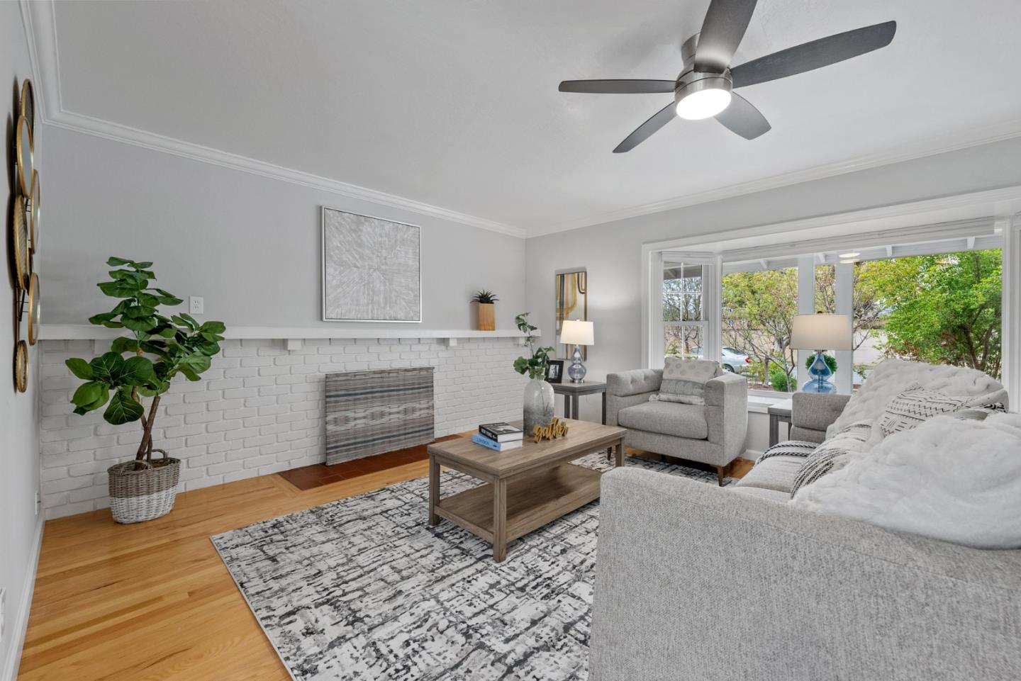 1130 Polk Lane San Jose, CA 95117 - Photo 8 of 47 a living room with furniture and a fireplace