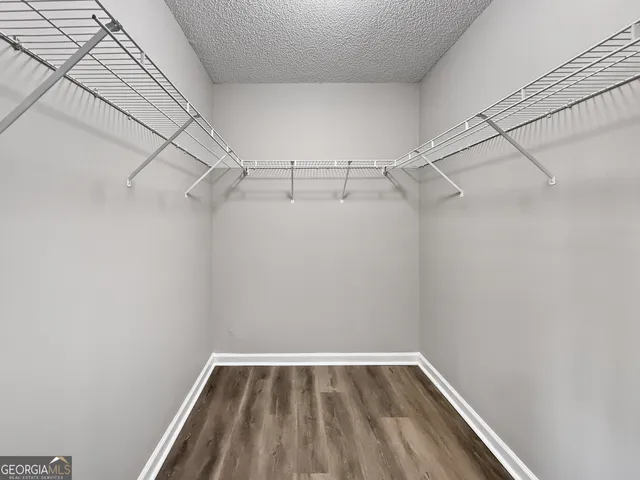 a view of a room with racks on the wall