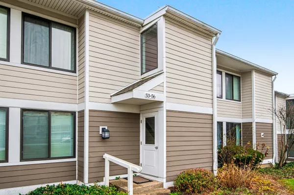 a view of a house with a small porch