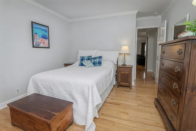 a front view of a house with a garden and pathway