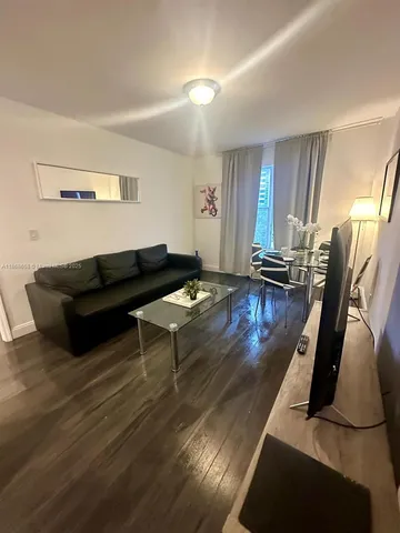 a view of street with parked cars