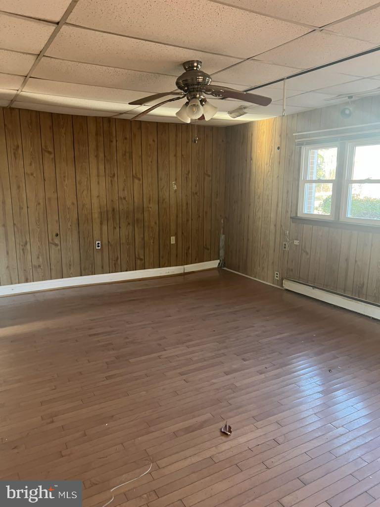 6640 Pomfret Road La Plata, MD 20646 - Photo 11 of 16 a view of an empty room with wooden floor