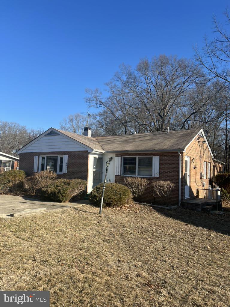 6640 Pomfret Road La Plata, MD 20646 - Photo 3 of 16 a front view of a house with a yard