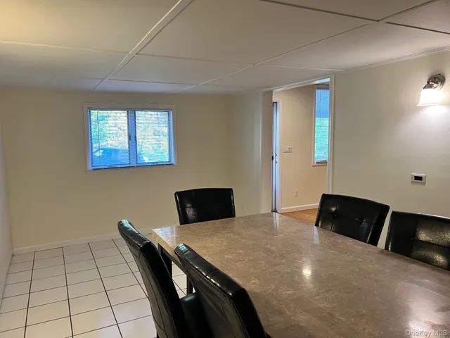 a bedroom with a bed and a desk