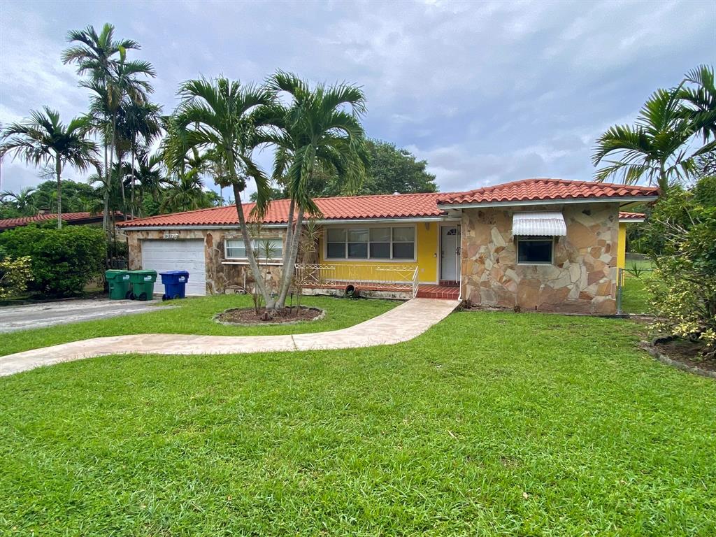 14131 Northwest 3rd Avenue, Unit C Miami, FL 33168 - Photo 7 of 7 a front view of house with yard and green space