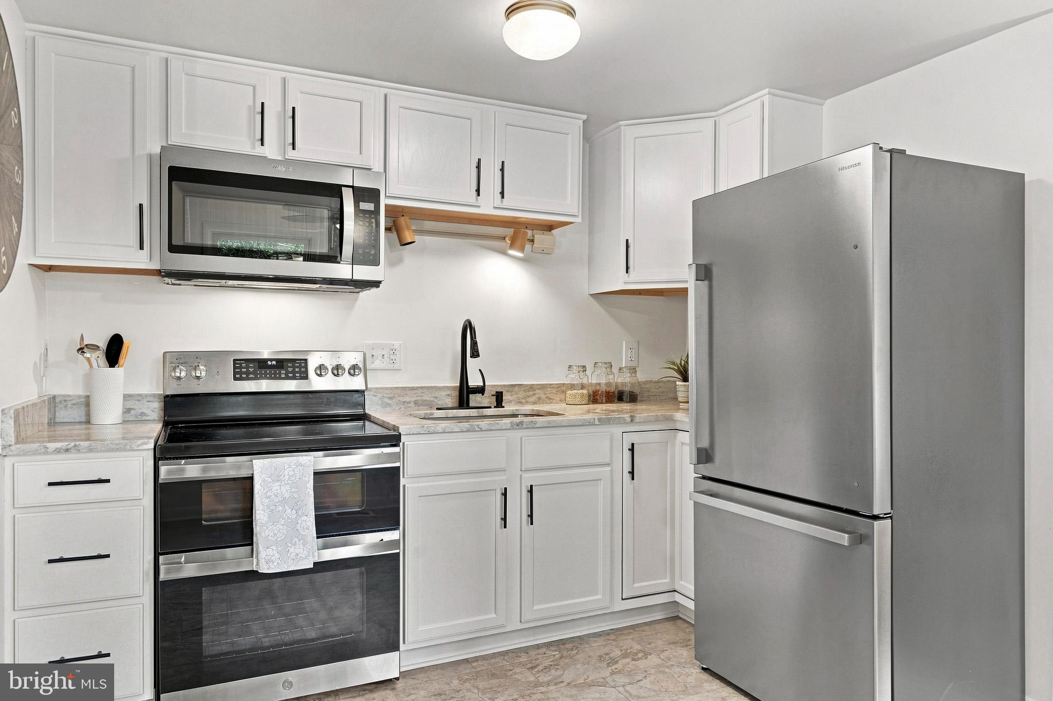 11407 Rawhide Road Lusby, MD 20657 - Photo 19 of 64 New stainless appliances.