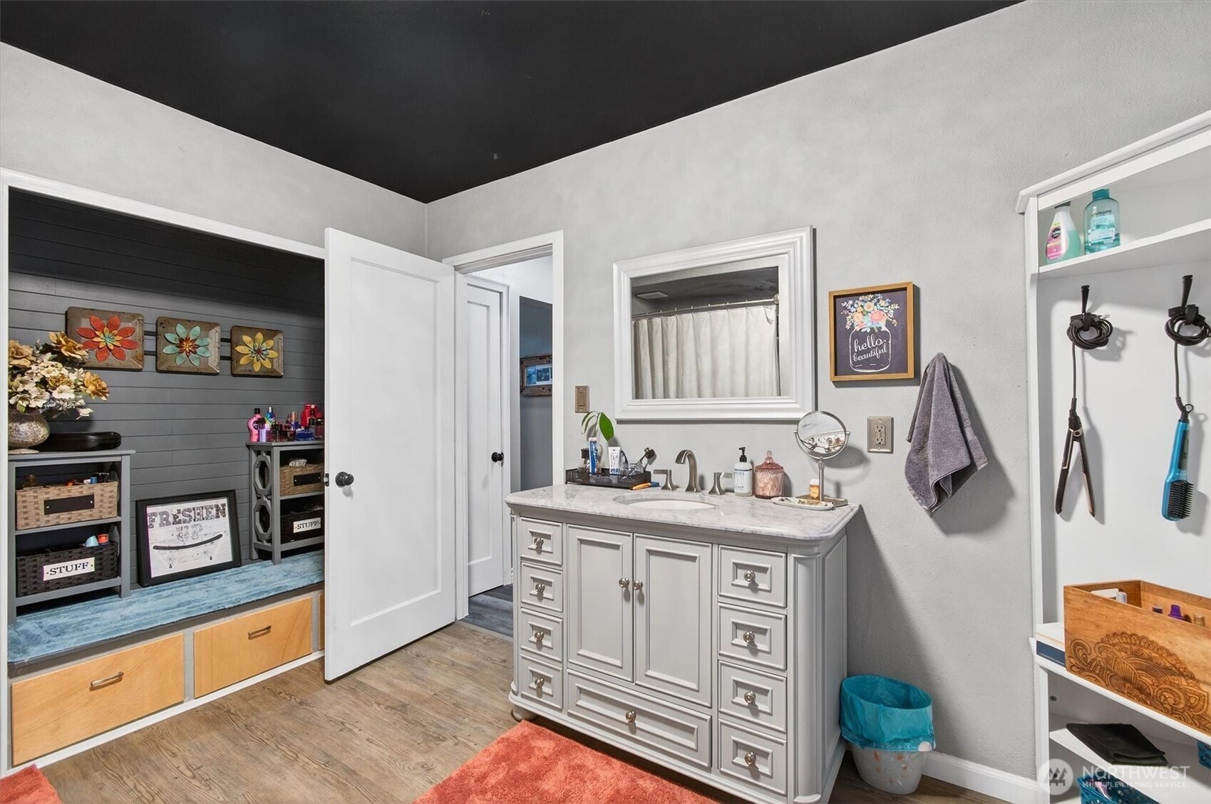 1210 8th Avenue Longview, WA 98632 - Photo 16 of 37 a hall with a stove a sink and a refrigerator