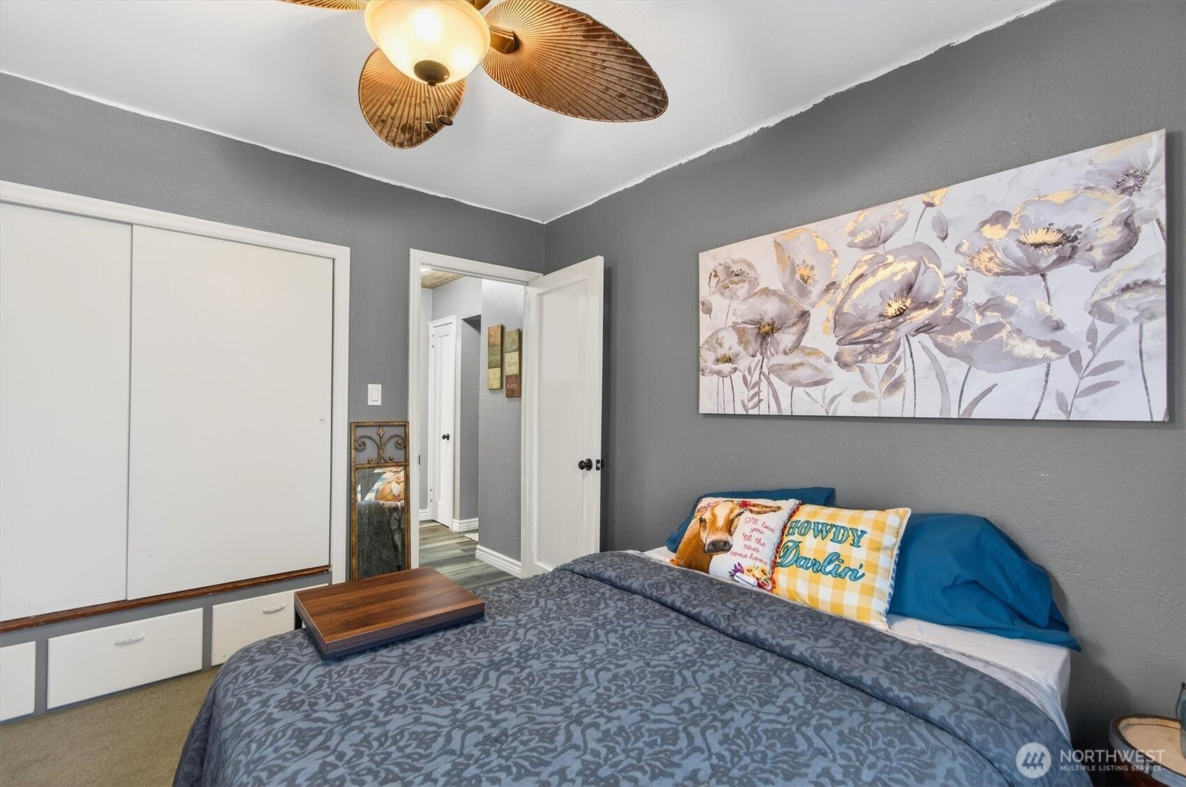 1210 8th Avenue Longview, WA 98632 - Photo 19 of 37 a bedroom with a bed and painting on the wall