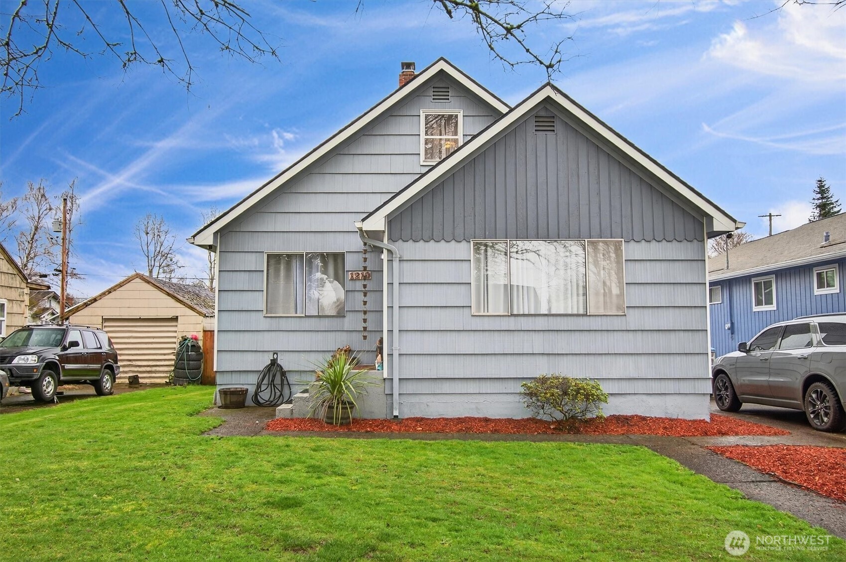 1210 8th Avenue Longview, WA 98632 - Photo 2 of 37 a view of a house with a yard