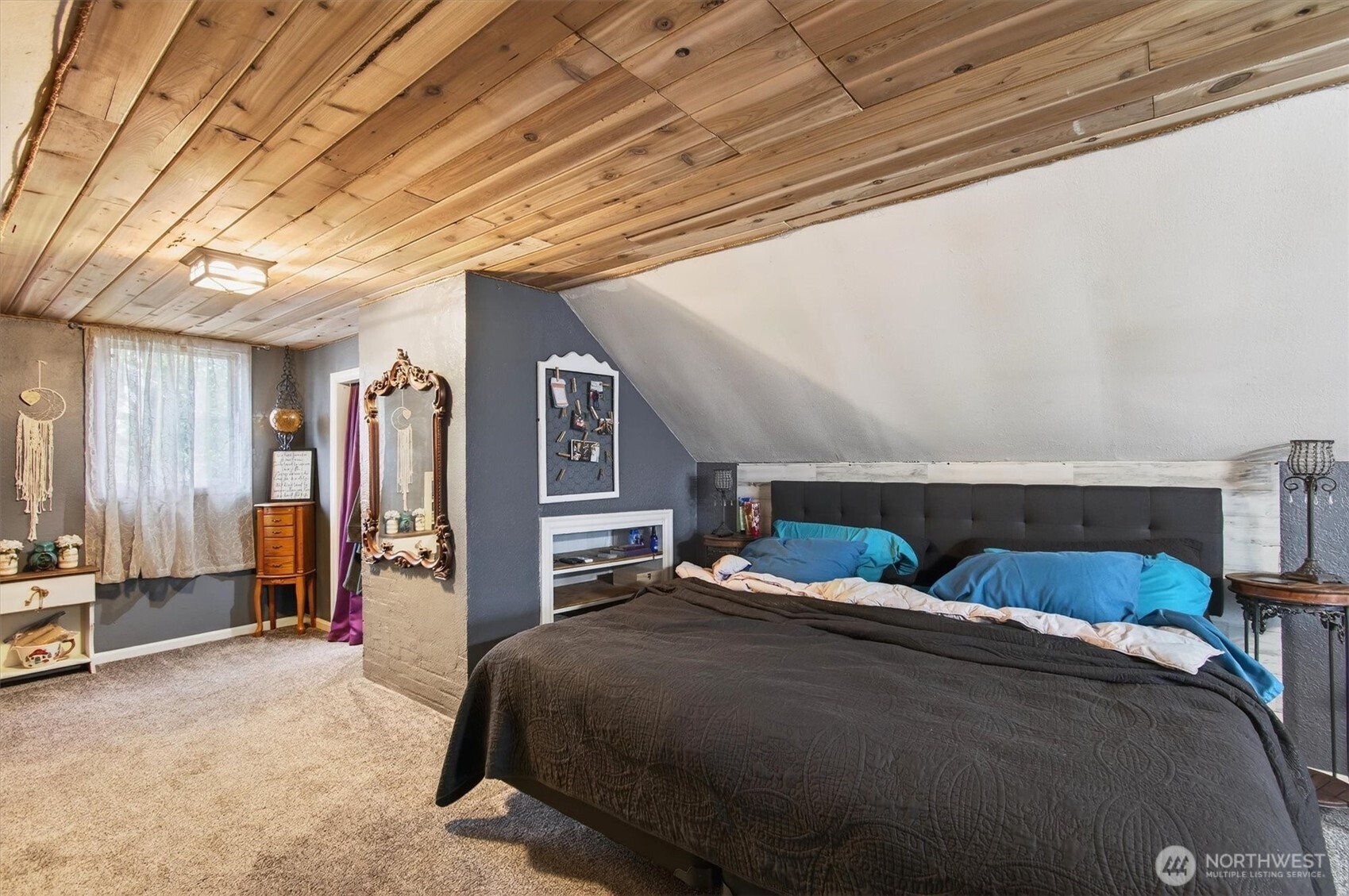 1210 8th Avenue Longview, WA 98632 - Photo 21 of 37 a bedroom with furniture and a bathroom