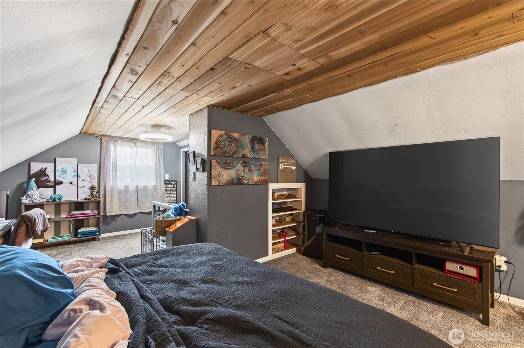 1210 8th Avenue Longview, WA 98632 - Photo 23 of 37 a living room with furniture and a flat screen tv